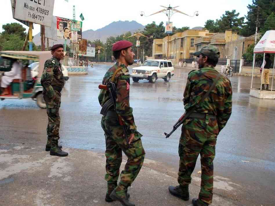 Pakistani security personnel stand alert on a street in Quetta in September. Proposed appropriations bills in both the U.S. House and Senate make economic and military assistance to Pakistan conditional.