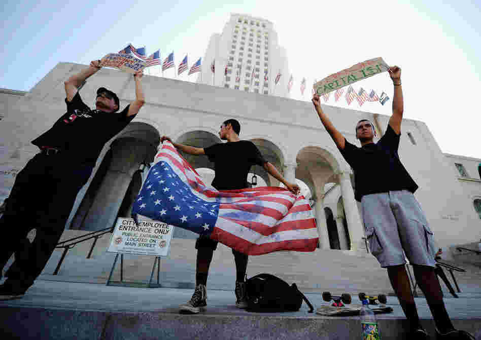 In Los Angeles, protesters marched to City Hall during the Occupy Los Angeles demonstration, held to show solidarity with the ongoing protest on Wall Street. 