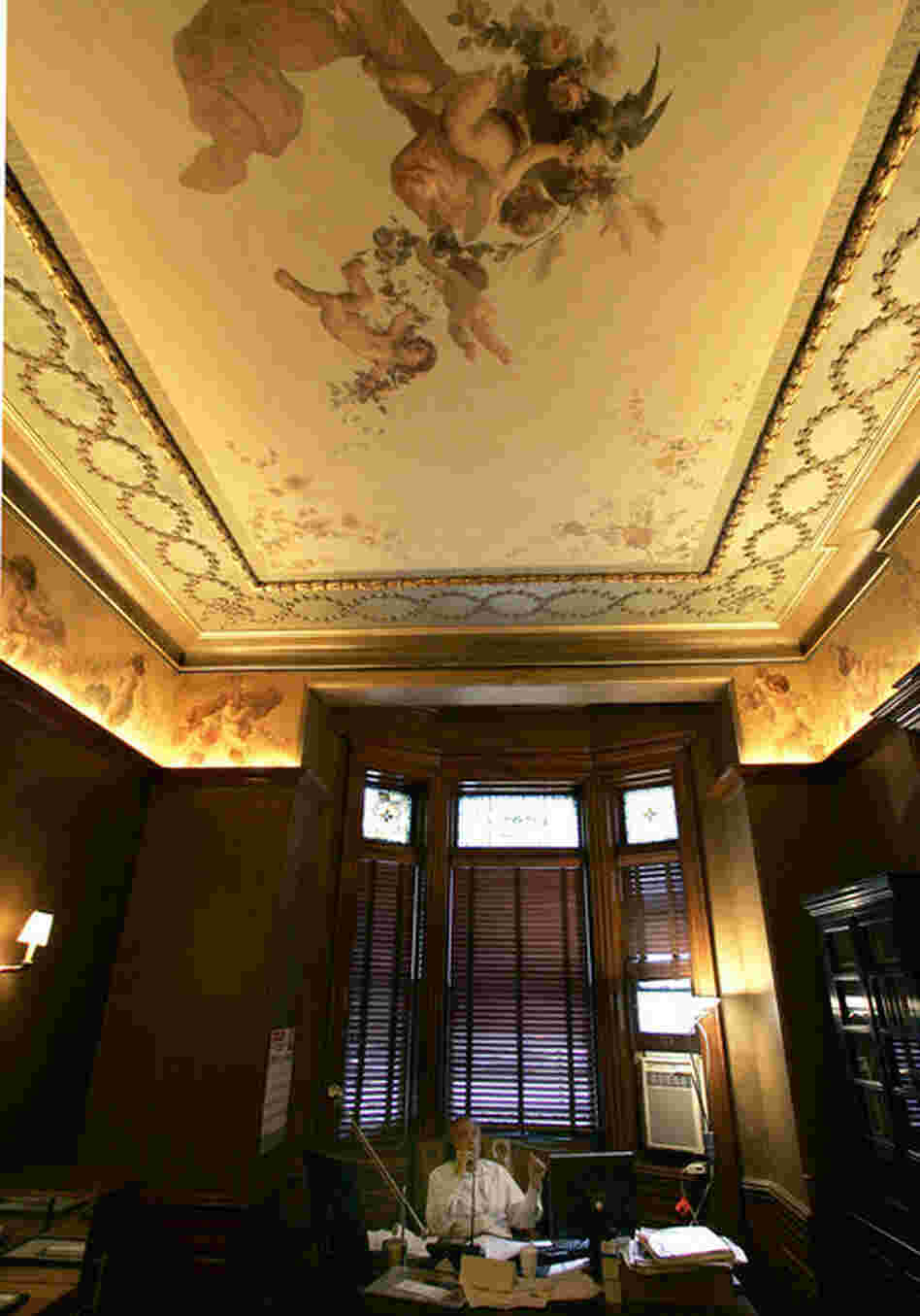 Former manager Stanley Bard, shown in his office in 2007, fostered the Chelsea's artistic community for more than 50 years. "He was kind of like a huge leaf that kids could go under away from the storm," says photographer turned bellman Timur Cimkentli. Bard was forced out by the hotel's board of directors in 2007. 