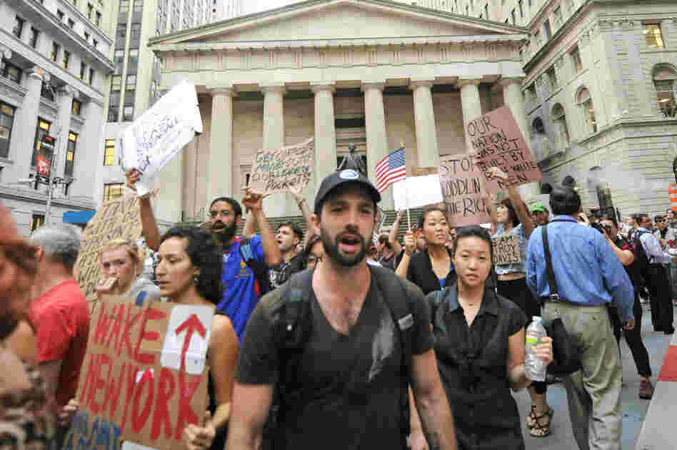 The Occupy Wall Street protest began more than two weeks ago. On Sept. 26, protesters marched past Federal Hall on Wall Street. 
