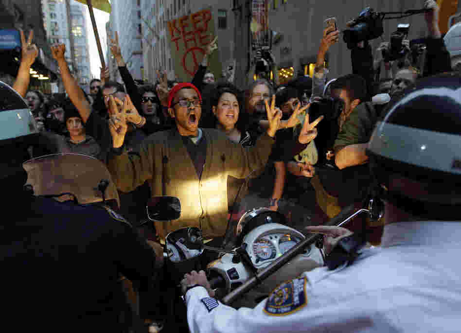 Occupy Wall Street protesters confront New York City police officers Friday. 
