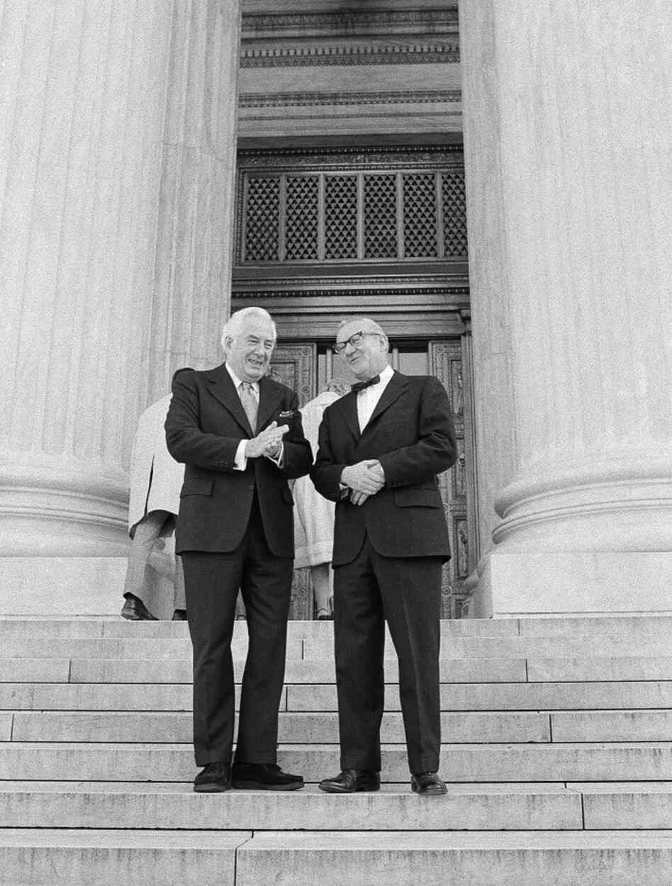 December 1975: Chief Justice Warren Burger (left) talks with Stevens on the steps of the Supreme Court before Stevens' swearing in as the 101st justice.