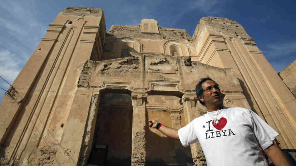 David Gerbi stands in front of the main synagogue in Tripoli, Libya, on Sunday. An exiled Libyan Jew, he has returned after being away for more than 40 years. He hopes to restore the synagogue and create an atmosphere of tolerance in the aftermath of Gadhafi's ouster. David Gerbi stands in front of the main synagogue in Tripoli, Libya, on Sunday. An exiled Libyan Jew, he has returned after being away for more than 40 years. He hopes to restore the synagogue and create an atmosphere of tolerance in the aftermath of Gadhafi's ouster.