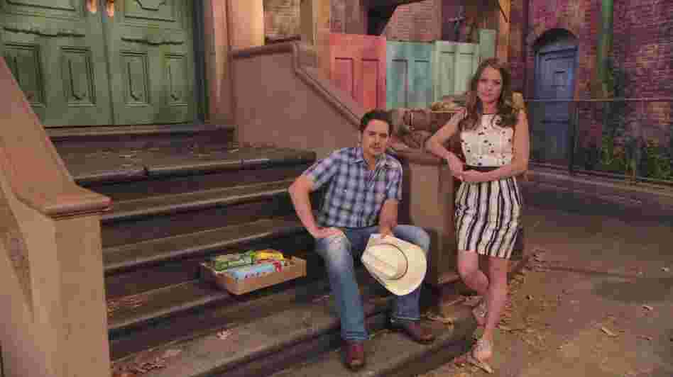 Country singer Brad Paisley and his wife, actress Kimberly Williams-Paisley, in Sesame Street's new special on child hunger. Country singer Brad Paisley and his wife, actress Kimberly Williams-Paisley, in Sesame Street's new special on child hunger.