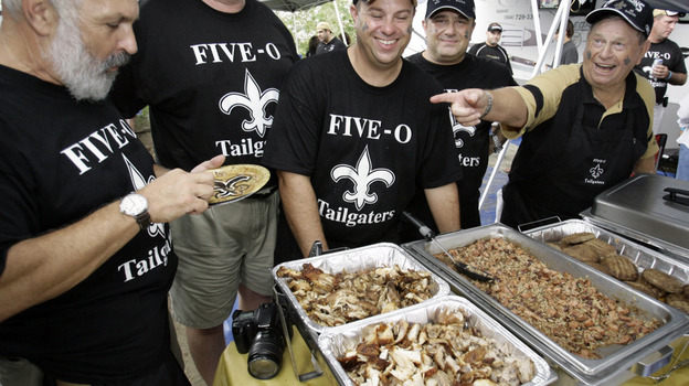 Tailgaters enjoy the food before a Tennessee Titans-New Orleans Saints football game in 2007.