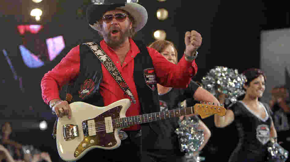 Hank Williams Jr., here seen promoting Monday Night Football, will not be part of tonight's broadcast after he made comments comparing President Obama to Hitler.
