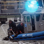 The pilot and three others were rescued; authorities are searching for one other passenger.