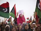 In Tripoli, Libya, women celebrate the revolution against Moammar Gadhafi's regime and call for a strengthening of women's rights, Sept. 2. After playing large but largely unsung roles during the uprising, women are now seeking a greater political role. In Tripoli, Libya, women celebrate the revolution against Moammar Gadhafi's regime and call for a strengthening of women's rights, Sept. 2. After playing large but largely unsung roles during the uprising, women are now seeking a greater political role.