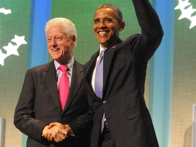 President Barack Obama and former President Bill Clinton shake hands at the Clinton Global Initiative on Sept. 21, 2011 in New York City. The three-day forum brought together world leaders and other dignitaries to discuss worldwide problems and potential solutions. 