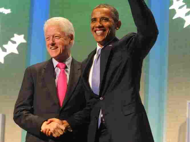 President Barack Obama and former President Bill Clinton shake hands at the Clinton Global Initiative on Sept. 21, 2011 in New York City. The three-day forum brought together world leaders and other dignitaries to discuss worldwide problems and potential solutions. 