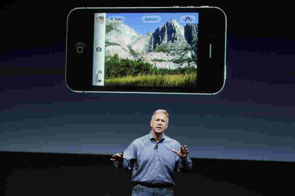 Apple marketing executive Phil Schiller describes the new iPhone 4S's camera, which includes 1080p HD video, at Apple headquarters in Cupertino, Calif. Apple marketing executive Phil Schiller describes the new iPhone 4S's camera, which includes 1080p HD video, at Apple headquarters in Cupertino, Calif.