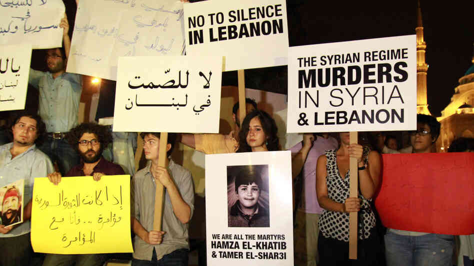 Lebanese and Syrian protesters demonstrate against the Syrian government in Beirut in August. Syrian defectors say they fear the Syrian regime will track them down, even in Lebanon. Lebanese and Syrian protesters demonstrate against the Syrian government in Beirut in August. Syrian defectors say they fear the Syrian regime will track them down, even in Lebanon.
