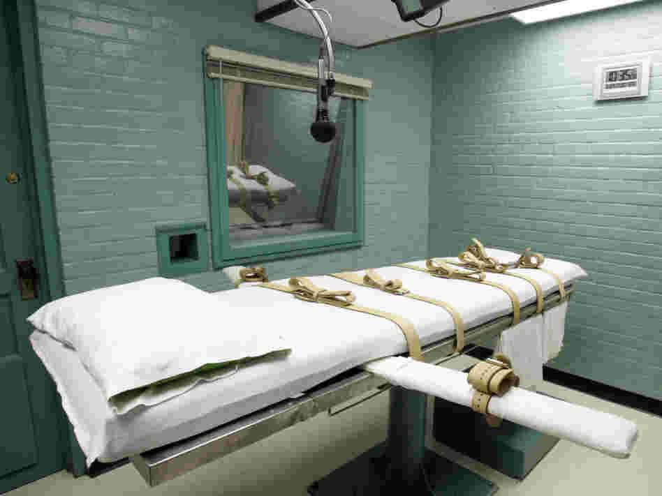 A microphone hangs over the gurney in the Texas death house in 2008 in Huntsville, Texas. 