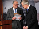 Left to right: Sen. Charles Schumer (D-N.Y.) and Senate Majority Leader Harry Reid (D-Nev.) at a news conference on Capitol Hill today. Left to right: Sen. Charles Schumer (D-N.Y.) and Senate Majority Leader Harry Reid (D-Nev.) at a news conference on Capitol Hill today.