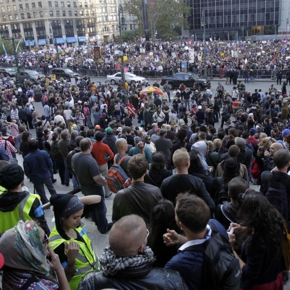 Occupy Wall Street protesters join a labor union rally in New York's Foley Square on Wednesday.