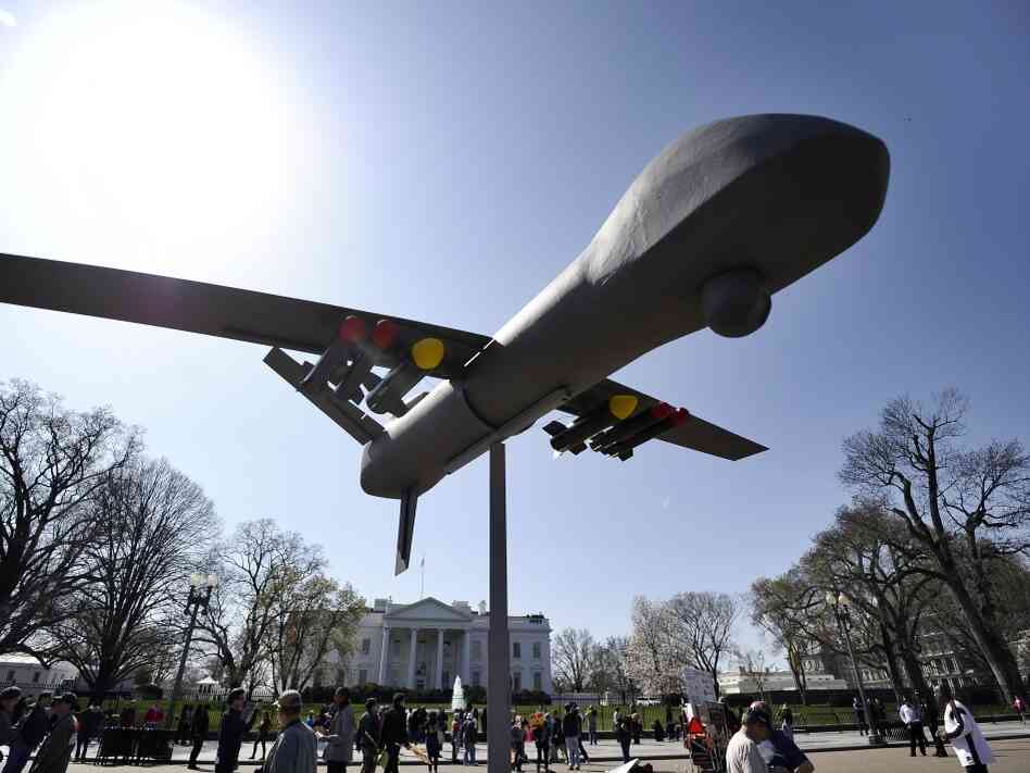 Anti-war protesters displays an effigy of a attack drone as they take part in a demonstration in front of the White House in Washington, DC, on March 19, 2011. Anti-war protesters displays an effigy of a attack drone as they take part in a demonstration in front of the White House in Washington, DC, on March 19, 2011.