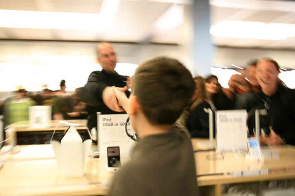 Alan shaking Steve Jobs' hand. Alan shaking Steve Jobs' hand.