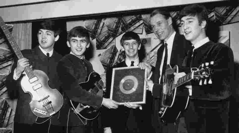 The Beatles, left to right: Paul McCartney, George Harrison, Ringo Starr, producer George Martin, John Lennon.