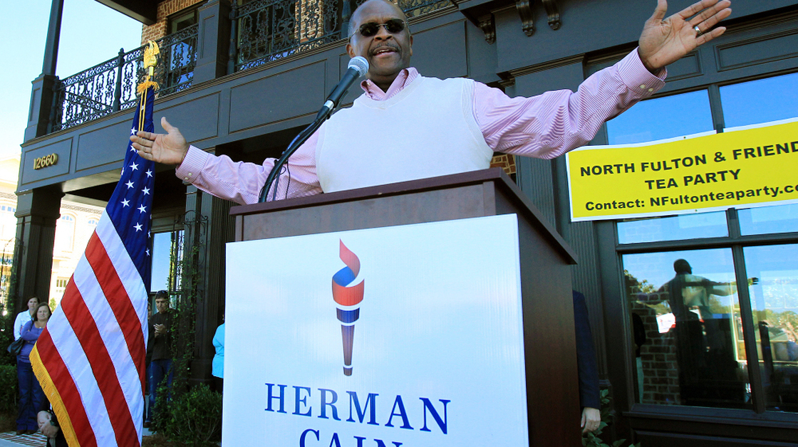 Republican presidential candidate and former Godfather's Pizza CEO Herman Cain, fresh off a surprising win in Florida's straw poll, speaks to supporters as he campaigns and launches his new book in Milton, Ga., earlier this month.
