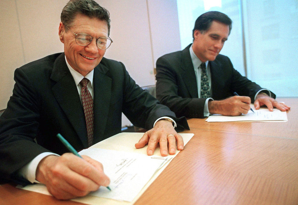 In 1998, Domino's Pizza founder and Chairman Thomas Monaghan and Mitt Romney, then-managing director of Bain Capital, sign an agreement for Monaghan to sell a "significant portion" of his stake in the company to Bain. With Romney at the helm, Bain Capital helped launch or reshape hundreds of companies, including Staples and Domino's Pizza. 