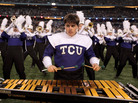With its jump to the Big 12 conference, Texas Christian University continues a game of musical chairs in college sports. With its jump to the Big 12 conference, Texas Christian University continues a game of musical chairs in college sports.