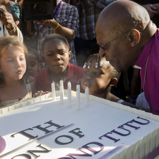 The archbishop accused the South African government of bowing to China by not granting him a visa.