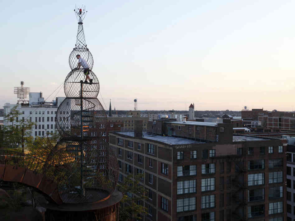 Matt Marek, 9, climbs to the top of a structure on the roof of the 600,000-square-foot City Museum, a former shoe factory turned avant-garde museum in St. Louis, Mon. Bob Cassilly, the museum's founder, died in late September. Matt Marek, 9, climbs to the top of a structure on the roof of the 600,000-square-foot City Museum, a former shoe factory turned avant-garde museum in St. Louis, Mon. Bob Cassilly, the museum's founder, died in late September.