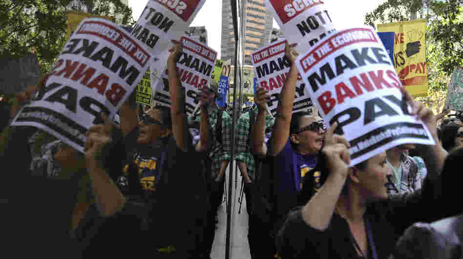 The Occupy Wall Street movement has spread to Washington, D.C., Los Angeles and other cities. In L.A. Thursday, protesters gathered outside a Wells Fargo downtown, above, and at a Bank of America branch where some were arrested for trying to protest inside. The Occupy Wall Street movement has spread to Washington, D.C., Los Angeles and other cities. In L.A. Thursday, protesters gathered outside a Wells Fargo downtown, above, and at a Bank of America branch where some were arrested for trying to protest inside.