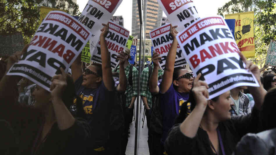 The Occupy Wall Street movement has spread to Washington, D.C., Los Angeles and other cities. In L.A. Thursday, protesters gathered outside a Wells Fargo downtown, above, and at a Bank of America branch where some were arrested for trying to protest inside. The Occupy Wall Street movement has spread to Washington, D.C., Los Angeles and other cities. In L.A. Thursday, protesters gathered outside a Wells Fargo downtown, above, and at a Bank of America branch where some were arrested for trying to protest inside.