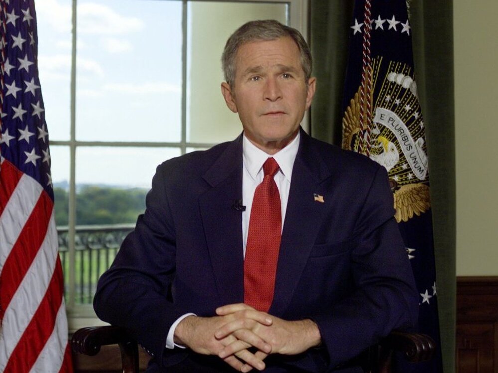 Oct. 7, 2001: President George W. Bush poses for a photo in the Treaty Room of the White House after announcing airstrikes on on Afghanistan.
