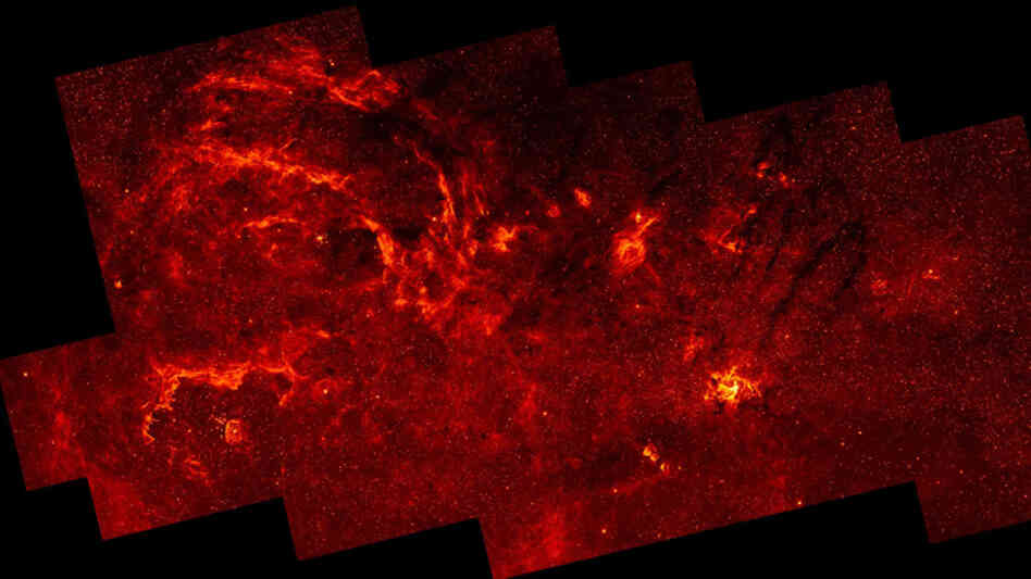 This infrared mosaic image, taken by the Hubble telescope, represents the "sharpest survey of the Galactic Center to date," NASA says.