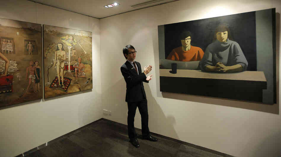 These two paintings were up for auction in Hong Kong in February. Art auctions produce eye-popping sales figures in China, though critics say there is a widespread problem with fakes. These two paintings were up for auction in Hong Kong in February. Art auctions produce eye-popping sales figures in China, though critics say there is a widespread problem with fakes.