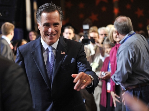 Republican presidential hopeful former Massachusetts Gov. Mitt Romney leaves after addressing the Family Research Council's Values Voter Summit in Washington.
