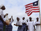 Members of the Women in Peacebuilding Network, started by Nobel Peace Prize winner Leymah Gbowee, sing as part of their daily activism for peace Monday, the eve of presidential elections in Monrovia, Liberia. Africa's first democratically elected female president, Ellen Johnson Sirleaf, who shares the Nobel Prize with Gbowee and a Tunisian peace activist, is seeking re-election. Members of the Women in Peacebuilding Network, started by Nobel Peace Prize winner Leymah Gbowee, sing as part of their daily activism for peace Monday, the eve of presidential elections in Monrovia, Liberia. Africa's first democratically elected female president, Ellen Johnson Sirleaf, who shares the Nobel Prize with Gbowee and a Tunisian peace activist, is seeking re-election.