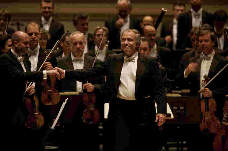 Valery Gergiev acknowledges the audience's cheers.