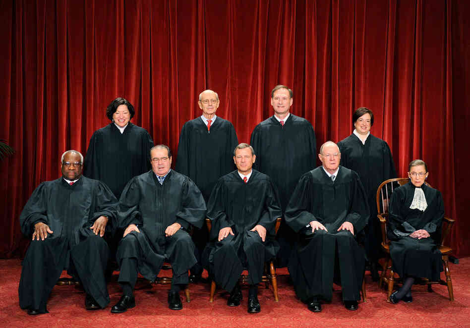 Thomas (front row, left) sits with the other justices for the annual Supreme Court photo on Oct. 8, 2010. 