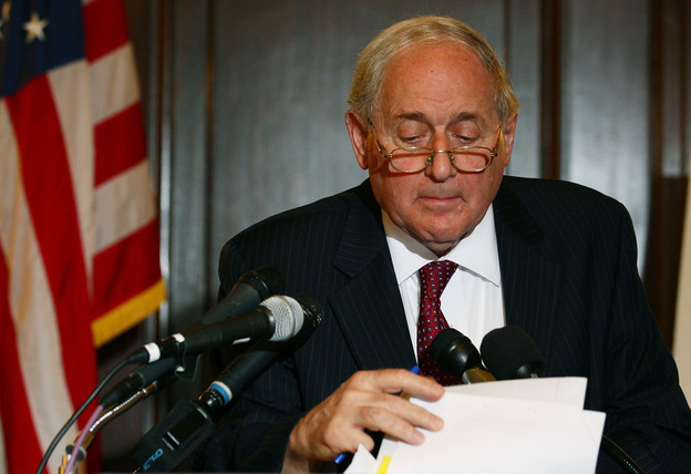 Senate Armed Services Chairman Carl Levin (D-MI), looks at his papers while talking about U.S. companies recieving large tax breaks, during a news conference on Capitol Hill.