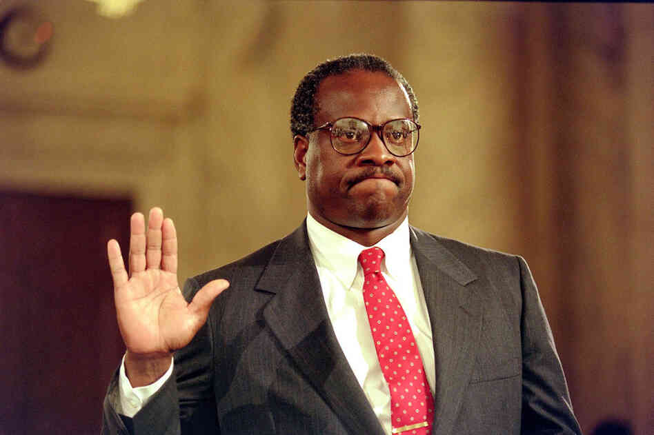Supreme Court nominee Clarence Thomas is sworn in on Sept. 10 1991, for his confirmation hearings before the Senate Judiciary Committee, in Washington D.C. 