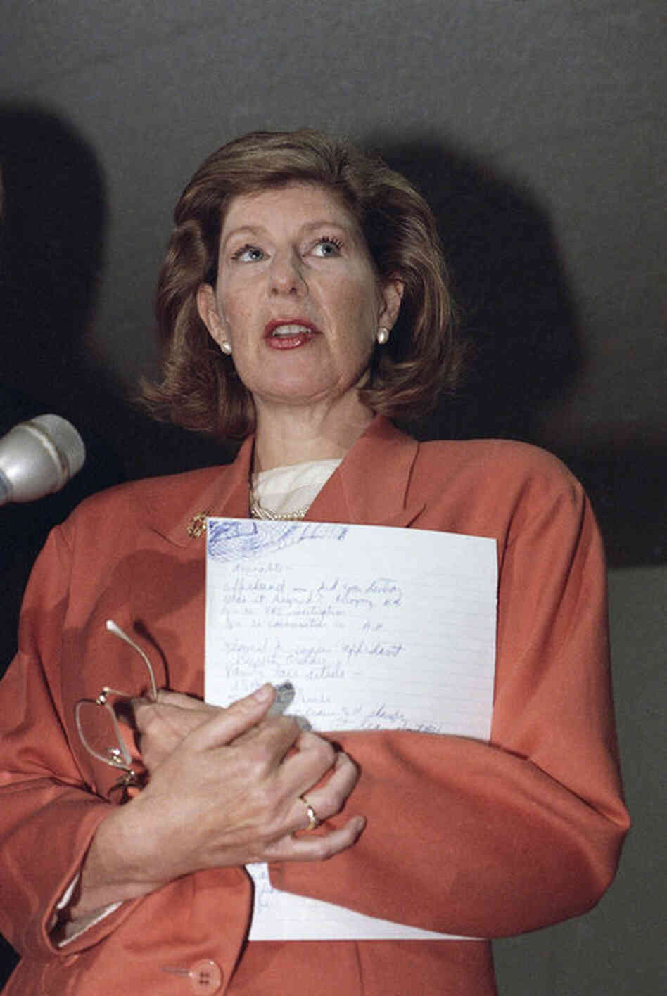 NPR's Nina Totenberg meets with reporters on Capitol Hill on Feb. 25, 1992, after refusing to identify to Senate special counsel Peter E. Fleming Jr. the sources who told her about the sexual harassment allegations against Thomas. Totenberg refused to cooperate in part because of "personal honor." 