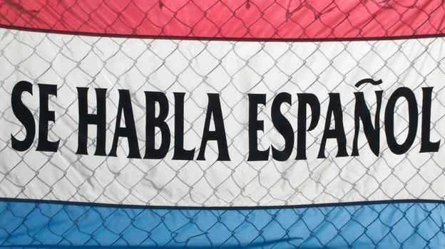A sign spells out Se Habla Espanol (Spanish Spoken Here). (iStockphoto.com)