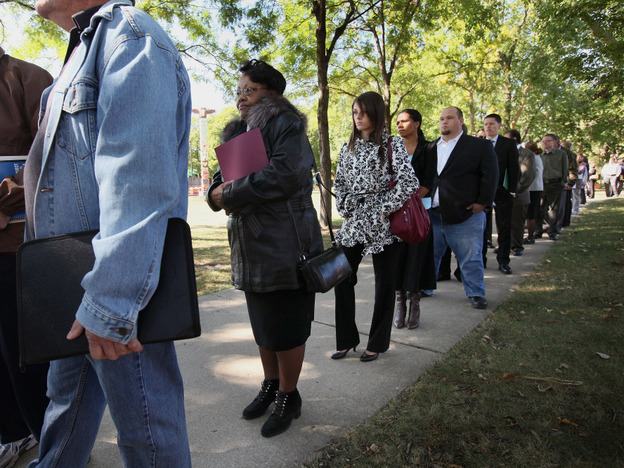 Job seekers waited in line to meet with recruiters at a job fair in Park Ridge, Ill., last month. 