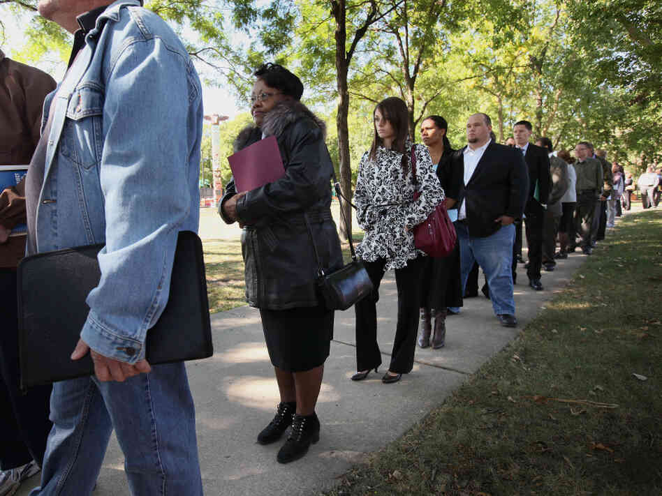 Job seekers waited in line to meet with recruiters at a job fair in Park Ridge, Ill., last month. 