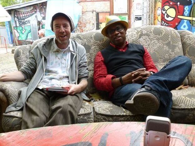 Ronald Lynch and Michael Thompson explain sound system history at reggae club YAAM in Berlin. Their exhibition, "The Reggae Movement Sound System: From Jamaica to Europe 1950-1995," is now on tour in Europe.