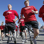 Military members who lost their limbs overseas participate in a run in California. Military members who lost their limbs overseas participate in a run in California.