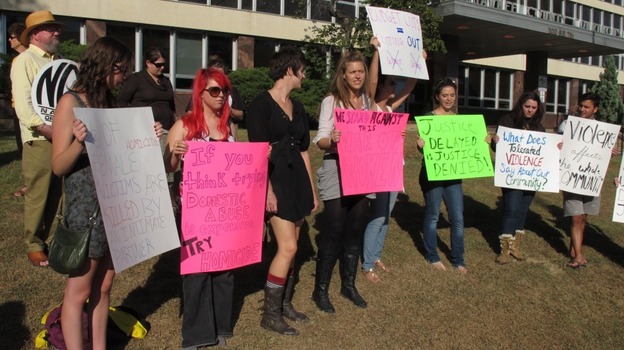 Tuesday, protesters gathered outside the Shawnee County Courthouse over a decision by District Attorney Chad Taylor to stop pursuing domestic violence and other misdemeanor cases.