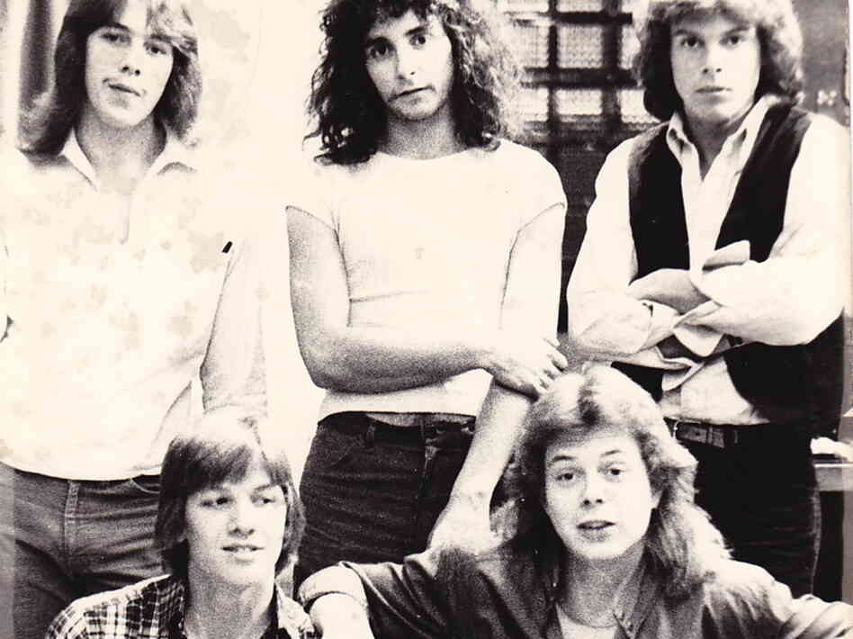 With shaggy hair and skinny jeans, Jon Huntsman (upper right) strikes a pose with his band, Wizard. 