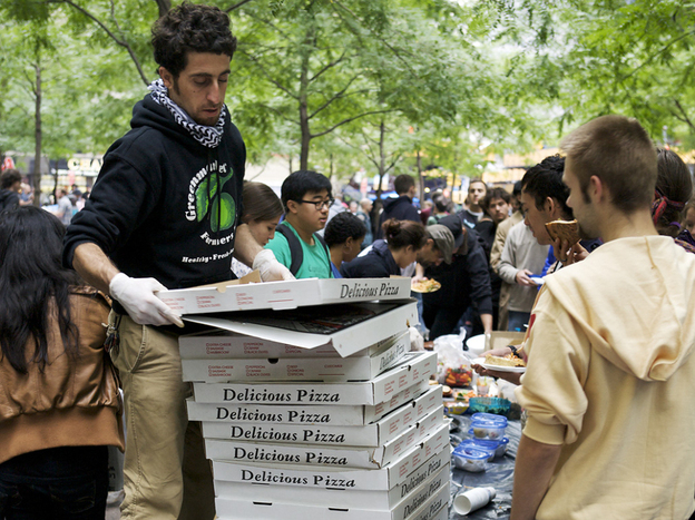 Donated pizzas are handed out in Zuccotti Park for the Occupy Wall Street protesters.
