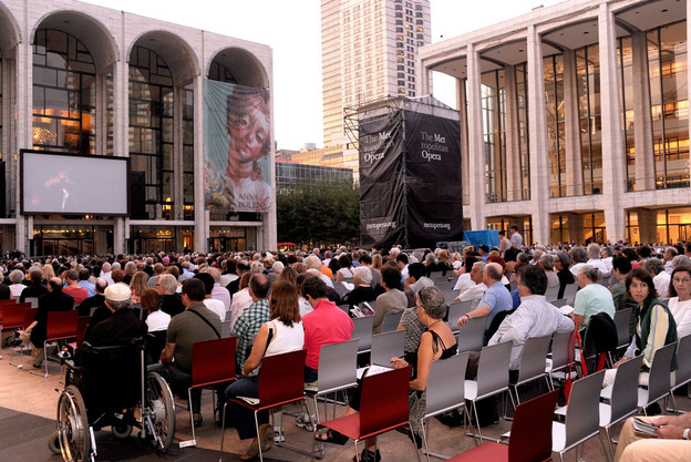 Opera lovers gather to watch the season opener, "Anna Bolena," for free outside the Metropolitan Opera on Sept. 26, 2011.