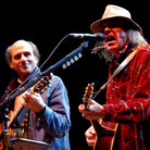 Neil Young performs with James Taylor at the 16th annual Bridge School benefit concert on Oct. 26, 2002. Neil Young performs with James Taylor at the 16th annual Bridge School benefit concert on Oct. 26, 2002.