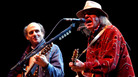 Neil Young performs with James Taylor at the 16th annual Bridge School benefit concert on Oct. 26, 2002. Neil Young performs with James Taylor at the 16th annual Bridge School benefit concert on Oct. 26, 2002.